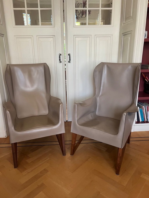 2x Giorgetti leather armchairs