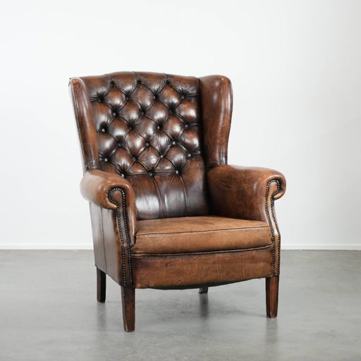 Unique large English-style sheepskin Chesterfield wing armchair