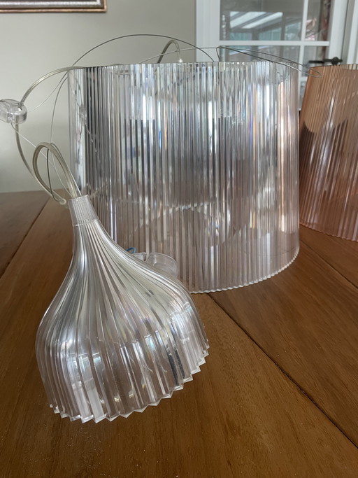 4 Kartell hanglampen, 2x doorzichtig, 2x rose(oranje)