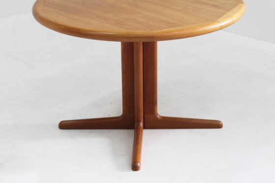 Image 1 of Vintage Danish round extendable teak dining table from the 1960s