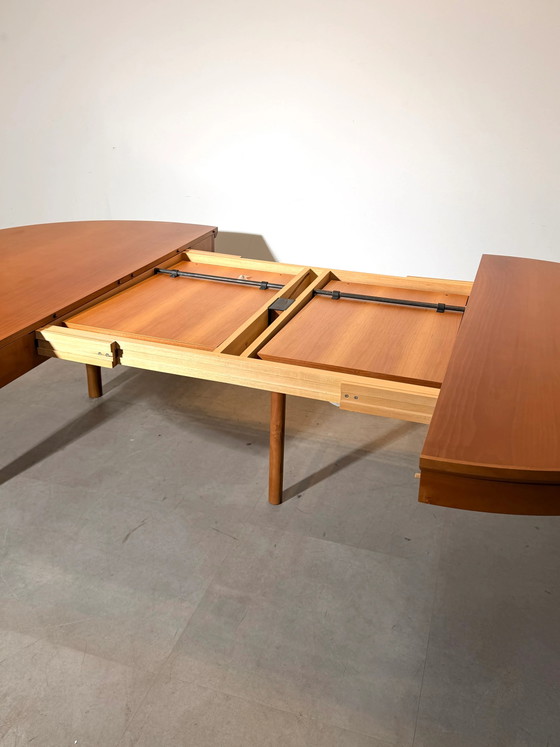 Molteni Table de salle à manger ronde extensible – Tables de salle à manger, Bois (photo 8 of 10)