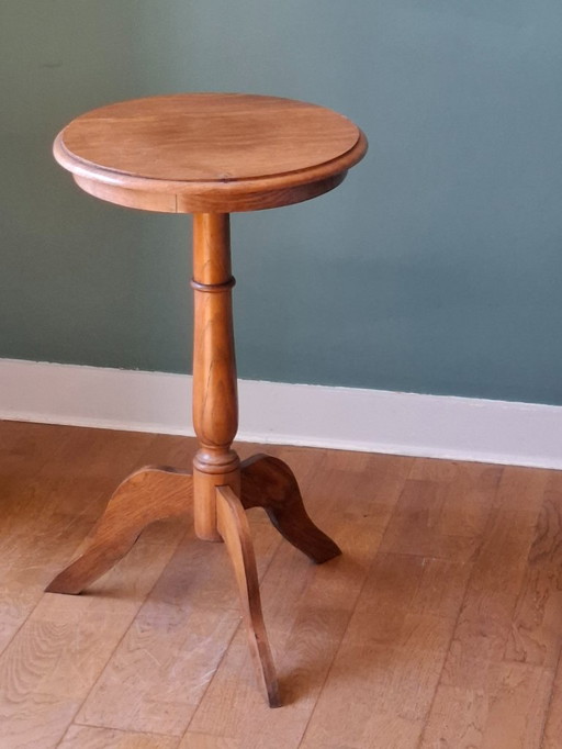 Mesa con pedestal de madera maciza