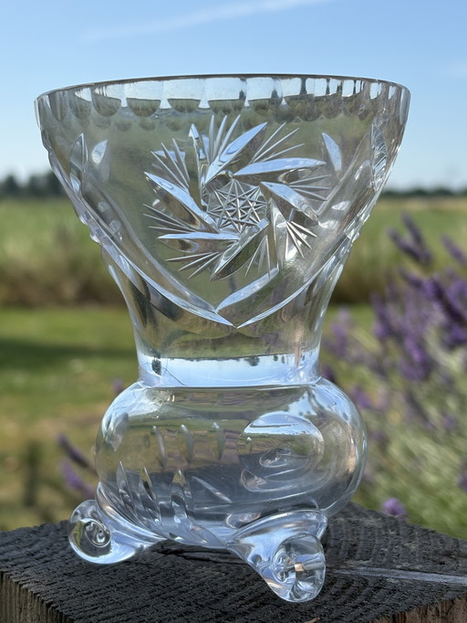Vintage crystal vase on ball feet