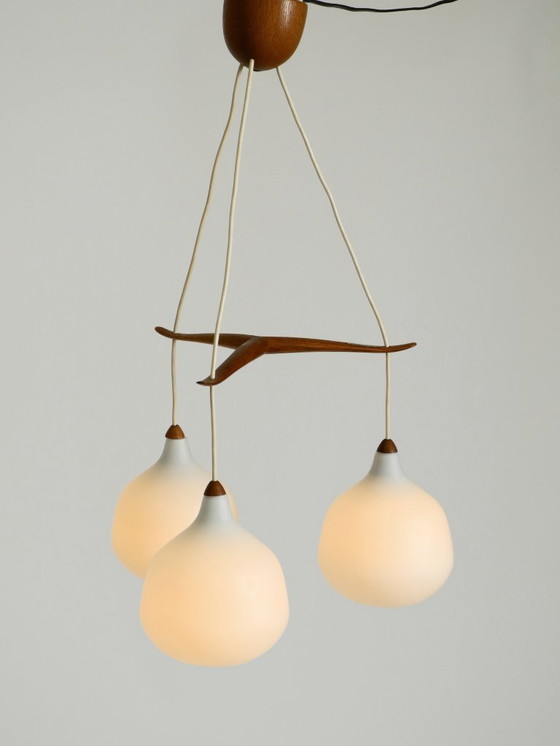 Image 1 of Beautiful pendant lamp with three opal glass shades and a teak frame by Uno & Östen Kristiansson for Luxus Vittsjö, Sweden 1957