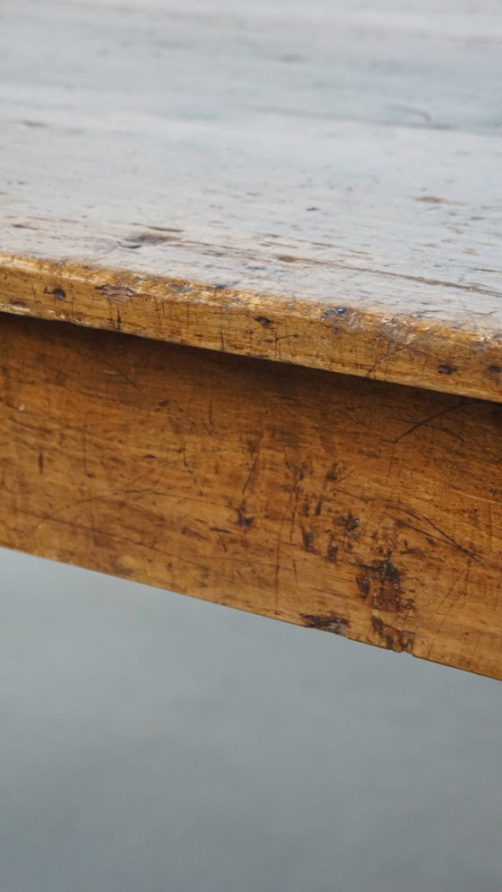 Image 1 of Antique French dining table from the early 19th century with two drawers and a breadboard / extendable top