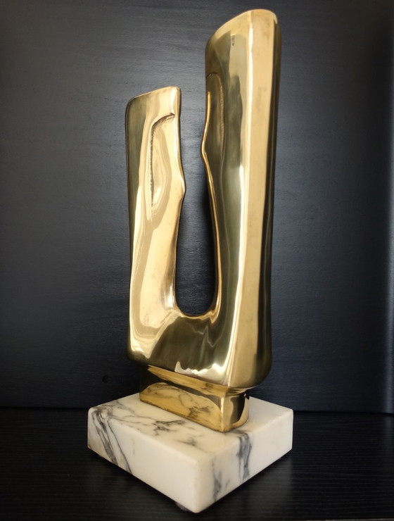 Image 1 of Sculpture en laiton poli d'après Gérard Koch.