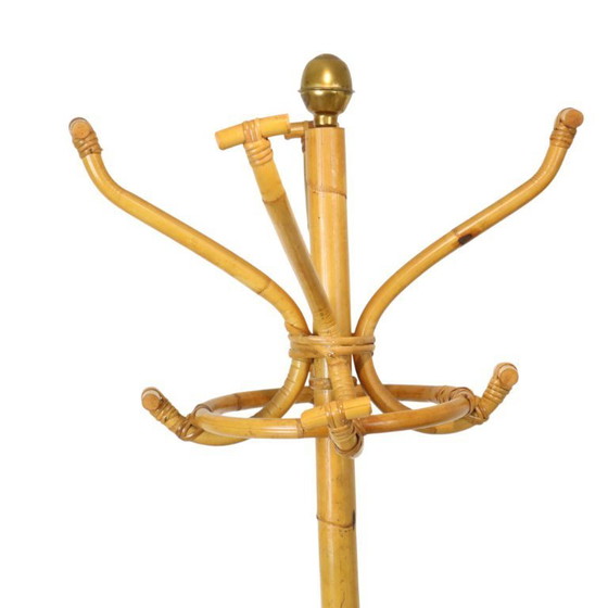 Image 1 of Raro perchero de pie de ratán latón