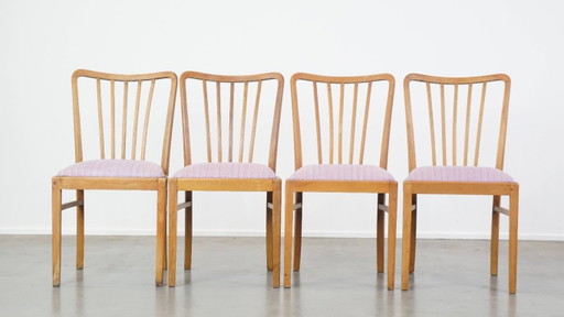 4 chaises de salle à manger vintage des années 70, avec assise en tissu et structure en bois. (photo 2 of 13)