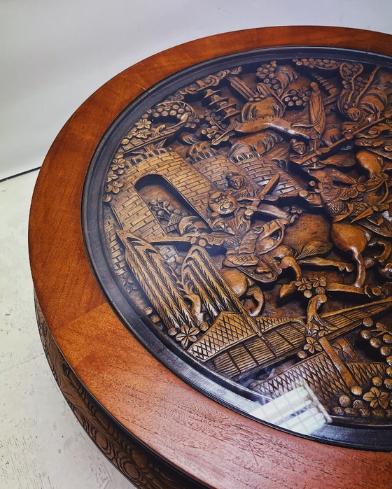 Image 1 of Round Wooden Coffee Table with Asian Carved Top