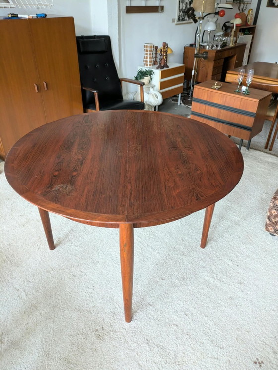 Vintage rosewood round extendable dining table (photo 4 of 11)
