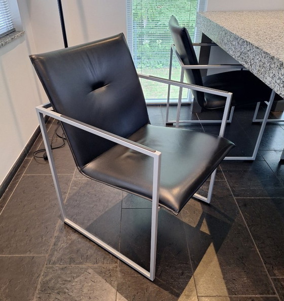 Image 1 of Zwart lederen Arco Frame eetkamerstoelen