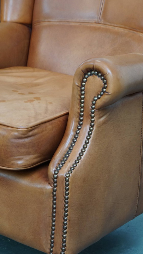 Image 1 of 2x Rundleren oorfauteuil afgewerkt met siernagels