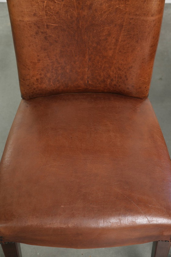 6x Begeerlijke schapenleren eetkamerstoel in een mooie cognac kleur met een mooi patina – Eetkamerstoelen (photo 7 of 17)