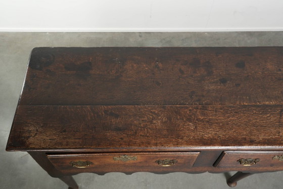 Image 1 of Large English antique oak sideboard/dresser with 3 working drawers from the early 18th century with a beautiful patina