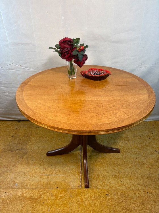 Image 1 of Mid-Century Retro Vintage Teak Extending Round Dining Table by Parker Knoll – 1970.    Elegant|Space-Saving|Practical|Iconic Bri