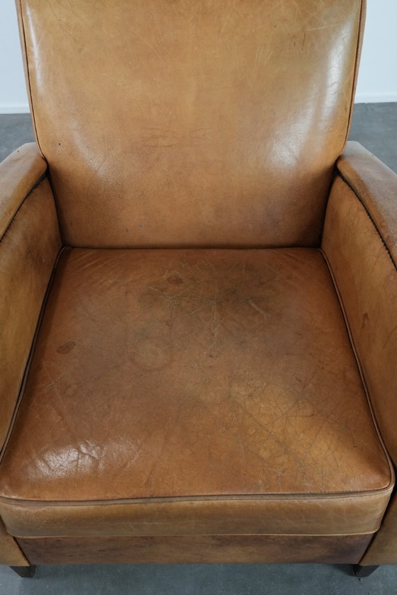 Image 1 of Luxurious armchair made of cowhide leather with a beautiful warm color scheme
