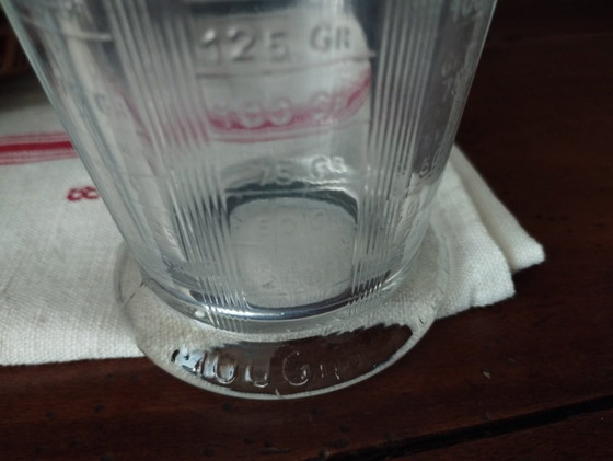 Image 1 of Mougin maatbeker van dik geperst glas