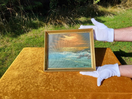 Pintura al óleo vintage enmarcada de paisaje marino al atardecer