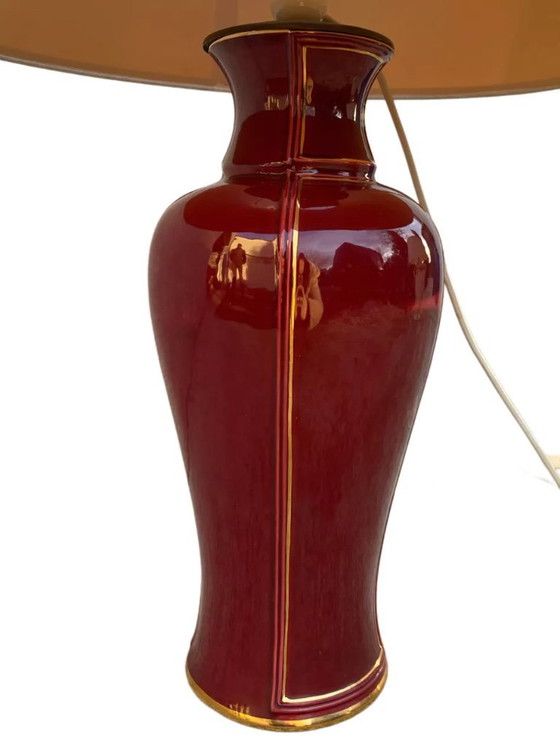 Image 1 of Large burgundy and gold vase-style table lamp