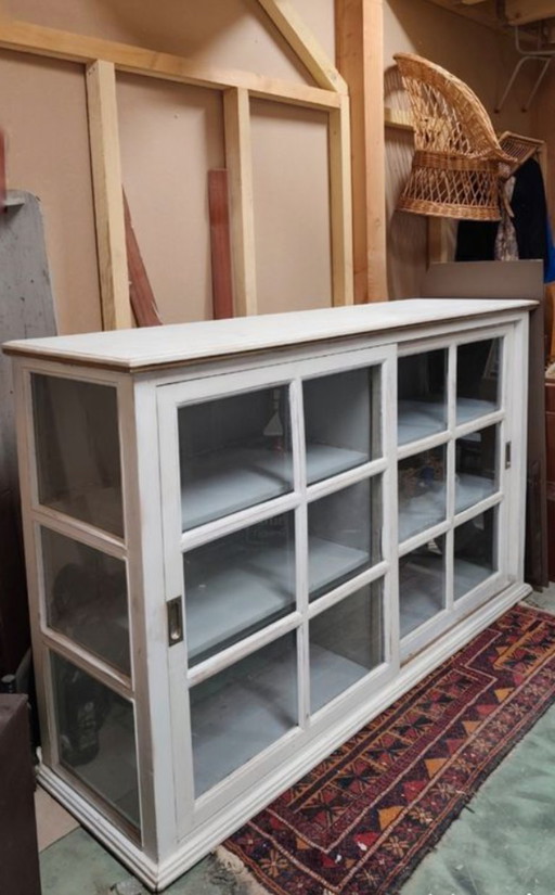 Antique low display cabinet in solid wood