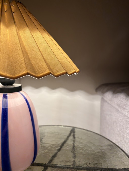 Unique table lamp with glass base