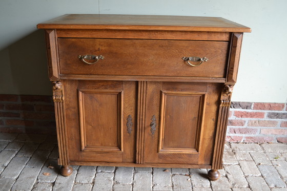 Image 1 of Antique oak wooden sideboard.