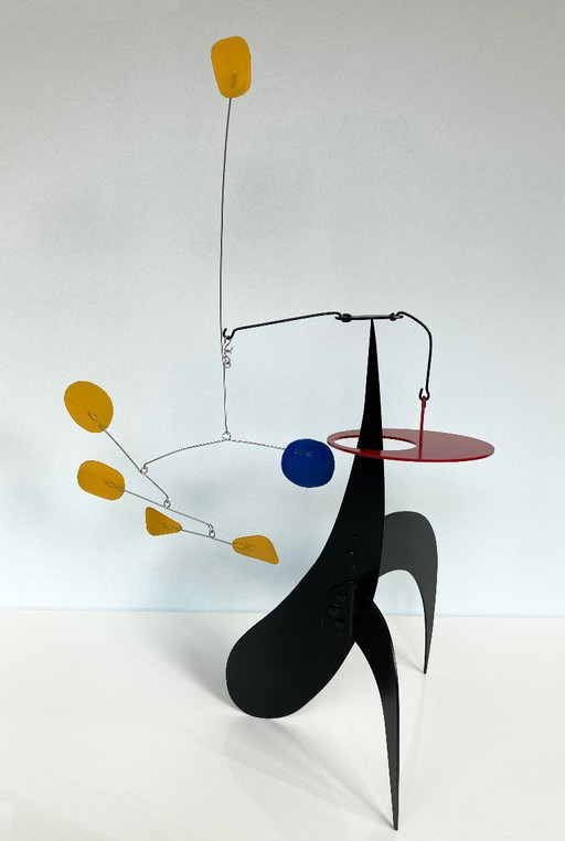 5 Yellow And 1 Blue on a black stabile