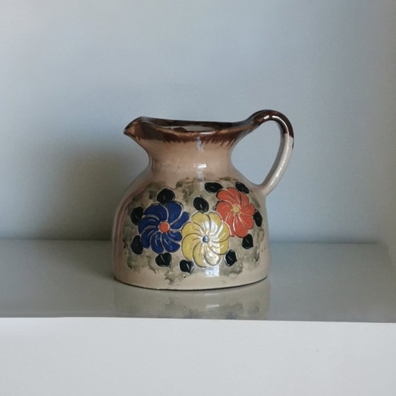 Image 1 of Cruche en argile faite main - signée