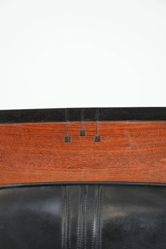 Image 1 of Black cowhide and wooden Art Deco design armchair by Schuitema from the Decoforma series with decorative cushion