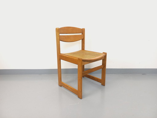 Vintage sled chair in beechwood and cane from the 70s and 80s