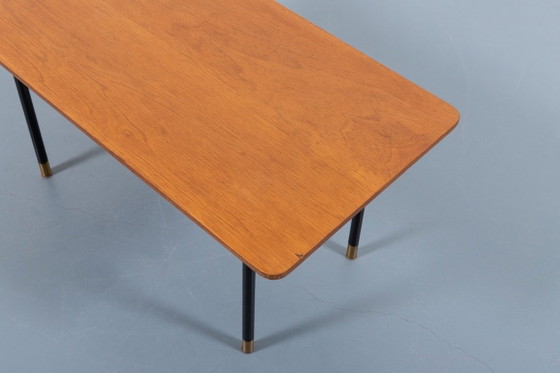 Image 1 of Italiaanse bijzettafel/salontafel uit de jaren 50 in de stijl van het mid-century modern.
