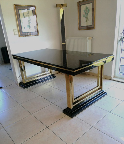 black lacquer dining table with brass inlays Hollywood Regency