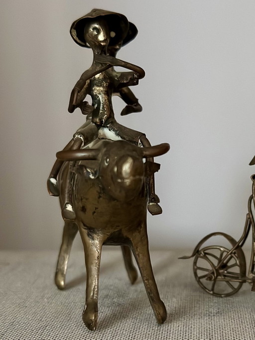 Vintage messing beeldje – twee figuren op een waterbuffel