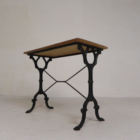Image 1 of Table de bistrot avec plateau en chêne sur une structure en fonte, années 1930