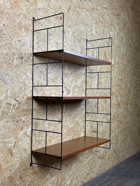 Image 1 of Anni '60-'70 scaffale in teak Scaffale a muro WHB Germania Scaffale a corda Design danese