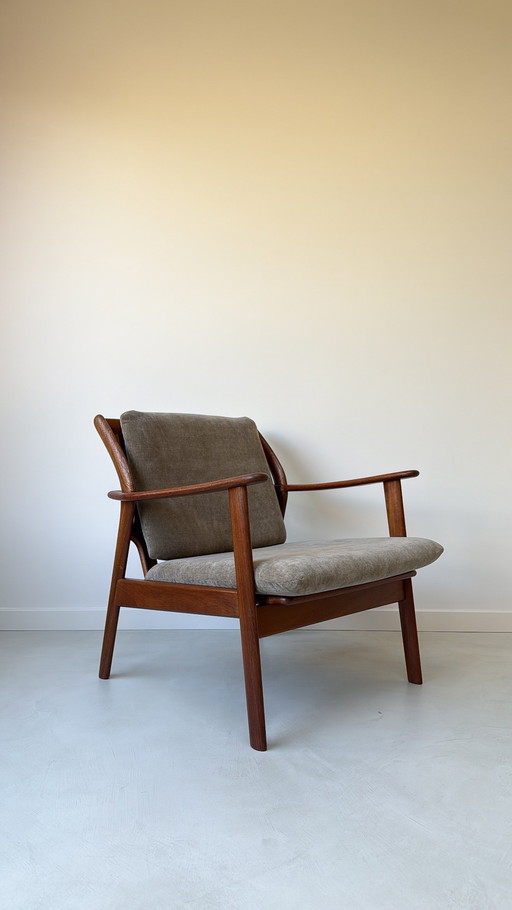 Vintage teak wooden armchair