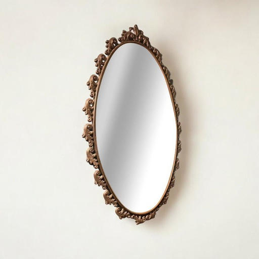 Large Art Nouveau mirror with floral metal frame in very good condition.