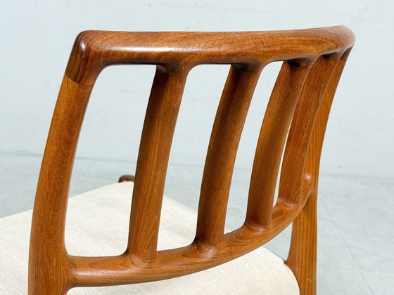 Image 1 of JL Møllers, ensemble de 4 chaises de salle à manger, modèle '83', teck, laine, années 1960, Danemark (4)