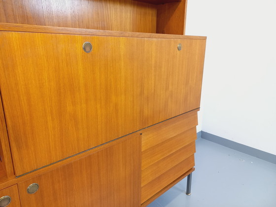 Image 1 of Louis Paolozzi's vintage modernist secretary bookcase for Monopoly in teak and metal from the 60s