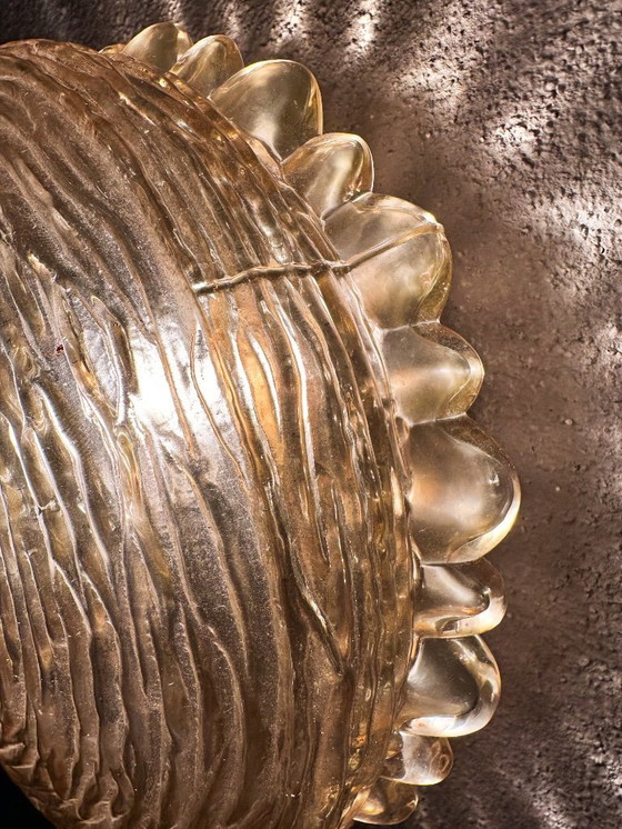 Image 1 of Vintage pair of amber glass wall lamps