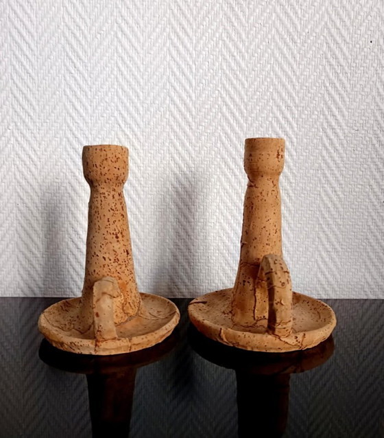 Image 1 of 2x vintage kurk en terracotta kaarsenhouders.