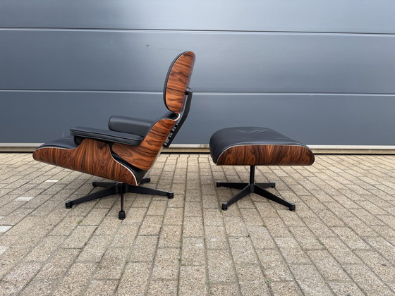 Image 1 of 2 poltrone lounge Vitra Eames XL originali con poggiapiedi, in pregiata pelle nera e palissandro Santos, NUOVE!!