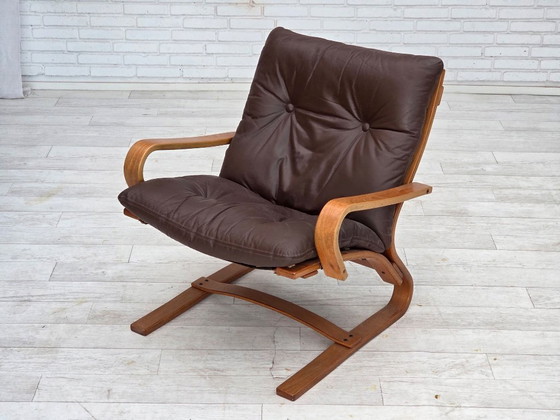 Image 1 of Fauteuil danois des années 1970 de la marque Komfort, cuir, toile et bois courbé.