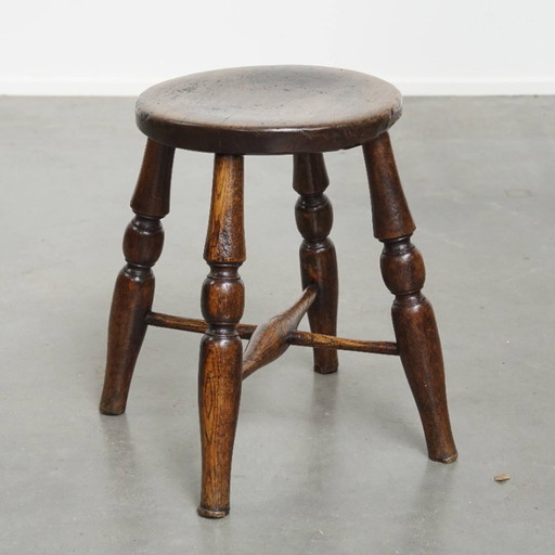 Antique English Windsor stool from early 19th century