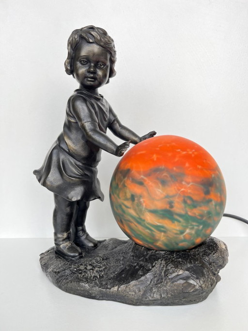 Lampada da tavolo vintage in stile Art Nouveau - Ragazza con palla di vetro arancione