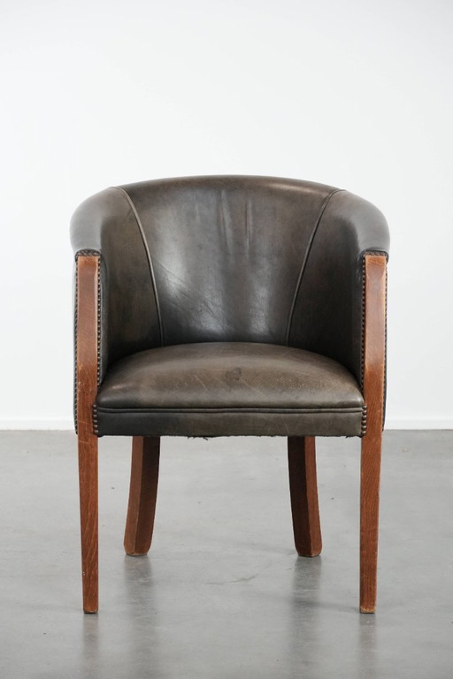 Sedia a vasca/sedia laterale in pelle di mucca e legno con una bellissima combinazione di colori