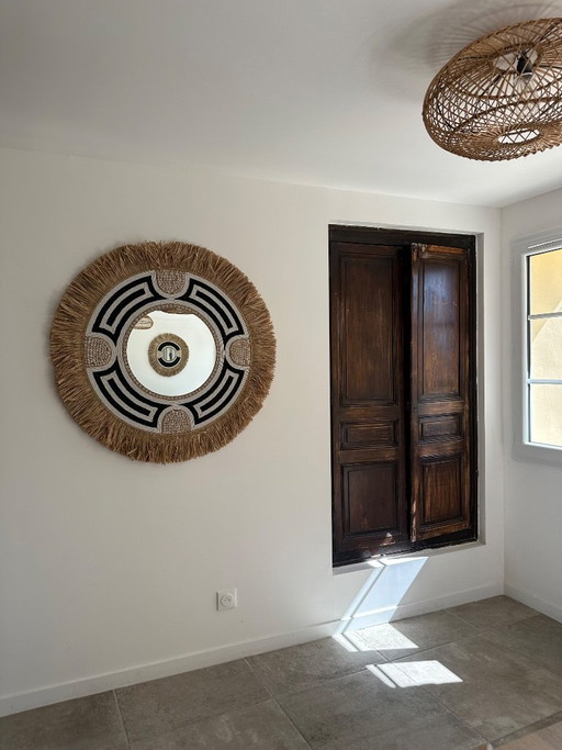 Large mirror made of seashell, pearl, and raffia
