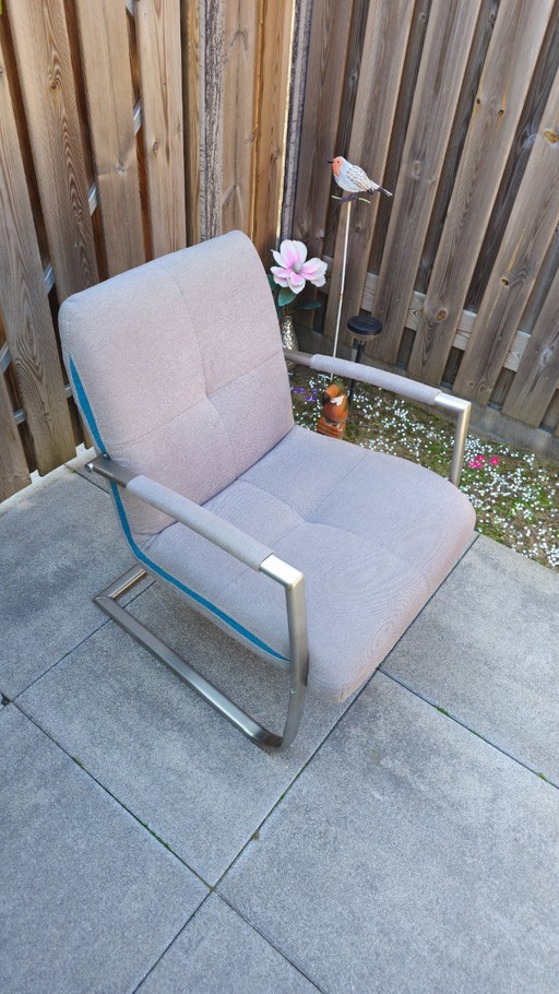 Fauteuil design en acier inoxydable gris