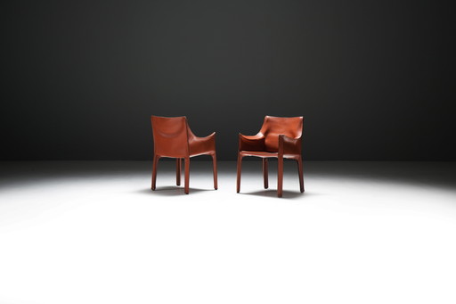 Early & matching Cab 413 Armchairs (2) in leather by Mario Bellini for Cassina.