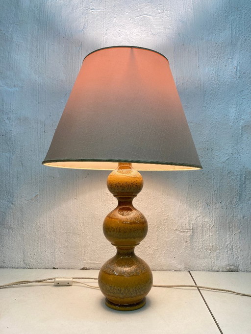 70s ceramic ball table lamp by Kaiser in ochre